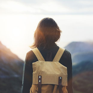  woman looking at sunrise