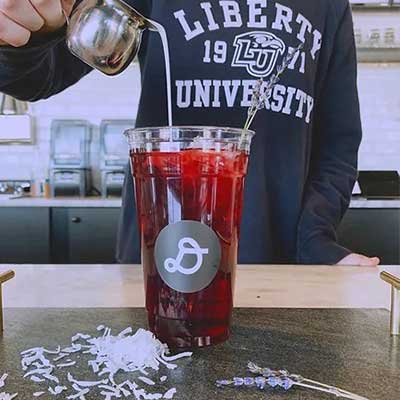 daily projects logo plastic cup with iced tea